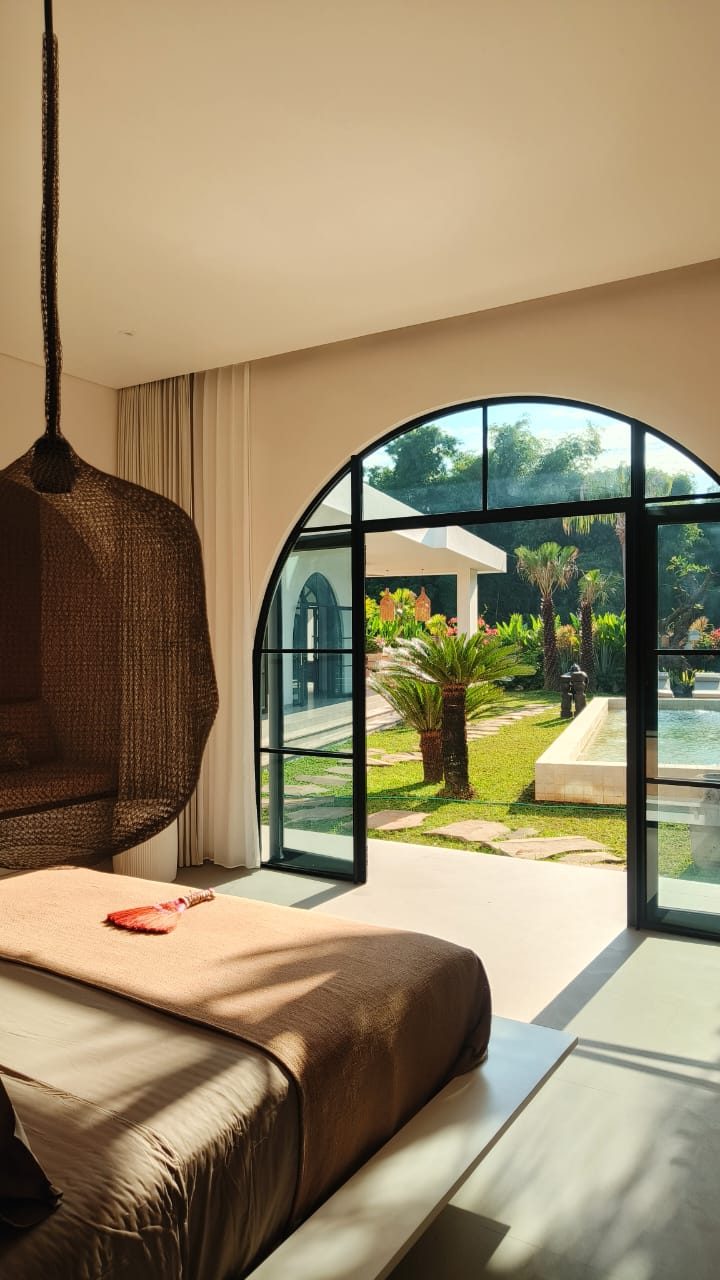 Chambre ouvrant sur le jardin